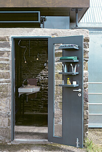 Bathroom with quarry stone wall