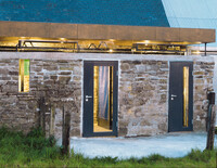 Quarry stone wall with new doors