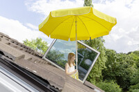 Mobile sundeck that pop out of a skylight
